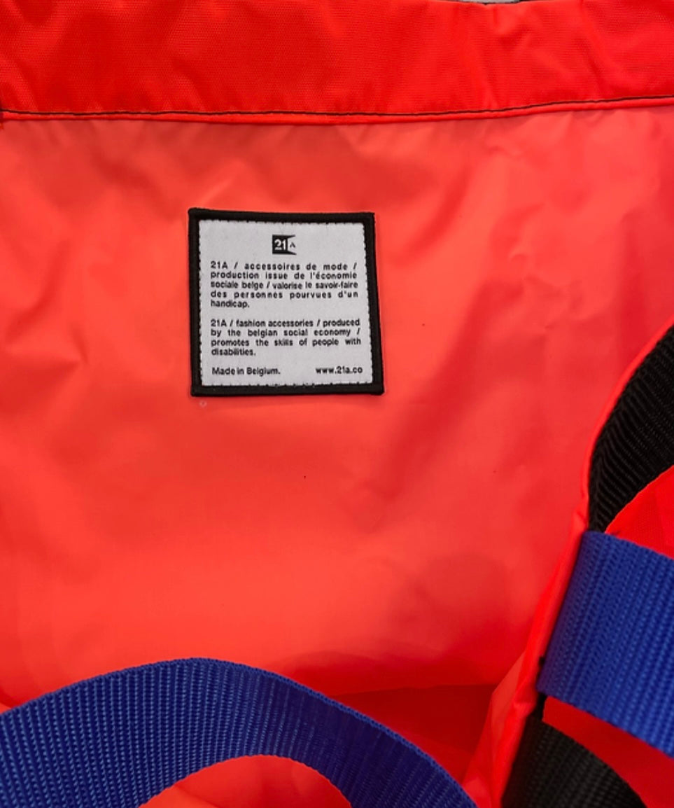 21 sac pliable orange fluo  étiquette 